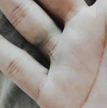 Why do sterling silver rings leave a green mark on my finger